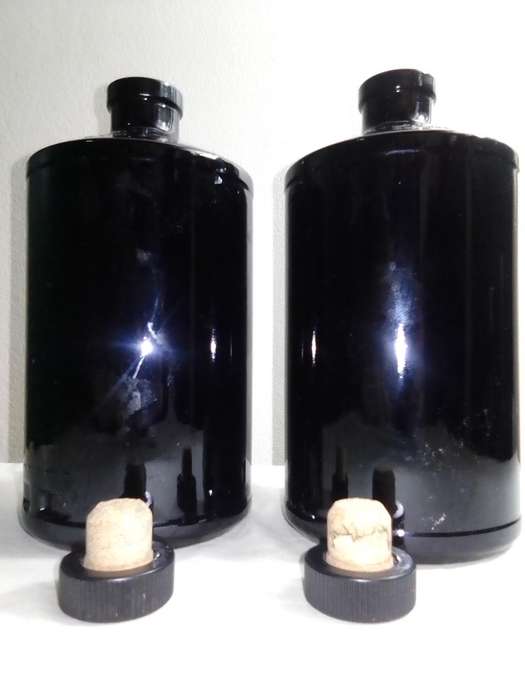 2 x empty Hendricks Gin  dark cobalt blue bottles. Introduced in 1999.
