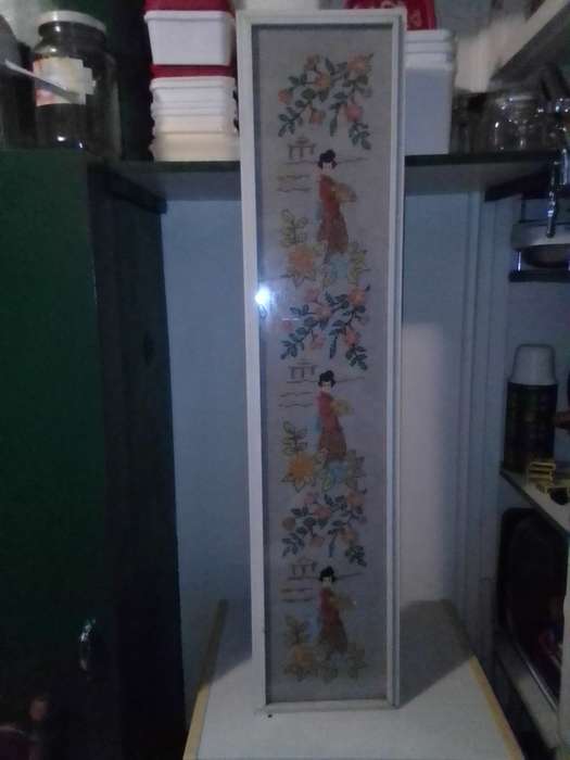 A long and narrow vertical wall art under glass wall hanging Chinese Tapestry.