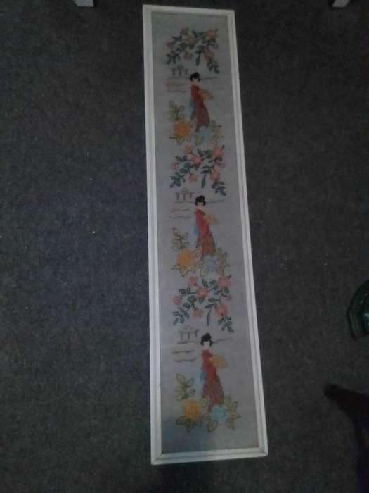 A long and narrow vertical wall art under glass wall hanging Chinese Tapestry.