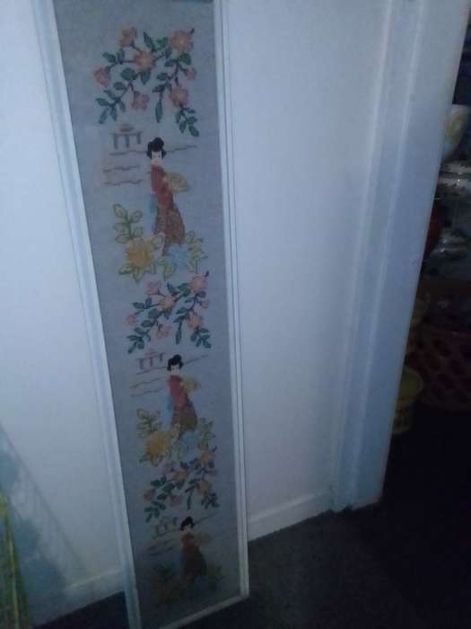 A long and narrow vertical wall art under glass wall hanging Chinese Tapestry.