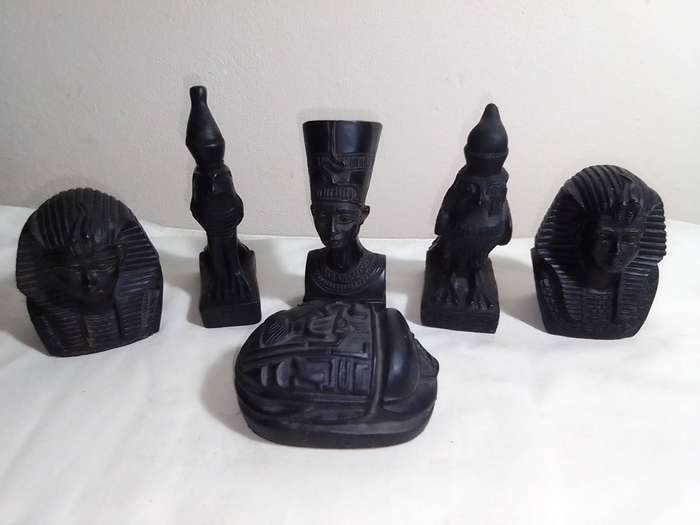 2 x Tutankhamun. Nefertiti busts, a Heart Scarab,2 x Bastet Head & Horus Falcon bird. Basalt Stone.