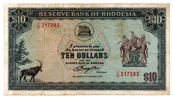 1979 Rhodesia 10 Dollars Pick#41 multiple folds, top edge tear