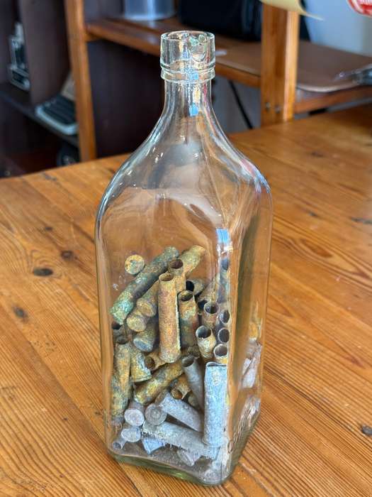 Vintage Glass Bottle Filled with .303 British Shell Casings  Circa 1930s
