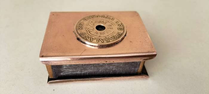 A Magnificent Copper/Brass Matchbox Cover With 1958 Coin