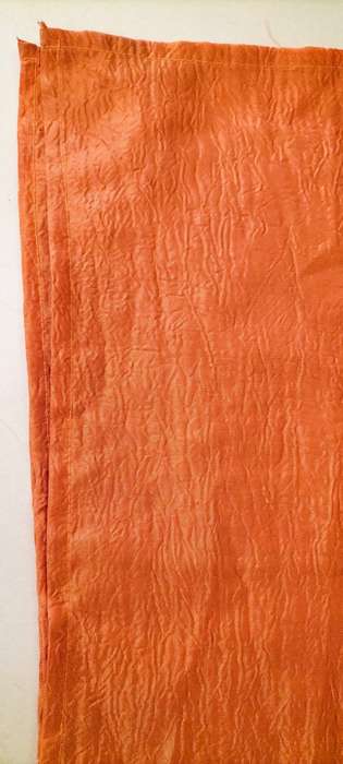A Beautiful Square Orange Table Cloth.