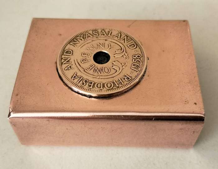 A Magnificent Copper/Brass Matchbox Cover With 1958 Coin