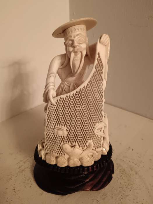 Carved Chinese Fisherman with Net