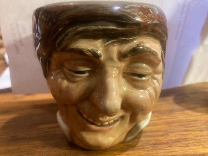 Collection of Royal Doulton character jugs , ashtrays and candle snufflers