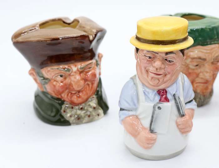 Collection of Royal Doulton character jugs , ashtrays and candle snufflers