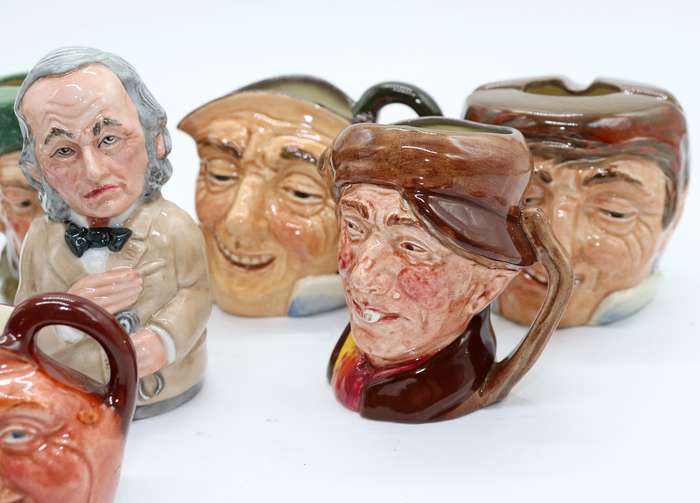 Collection of Royal Doulton character jugs , ashtrays and candle snufflers