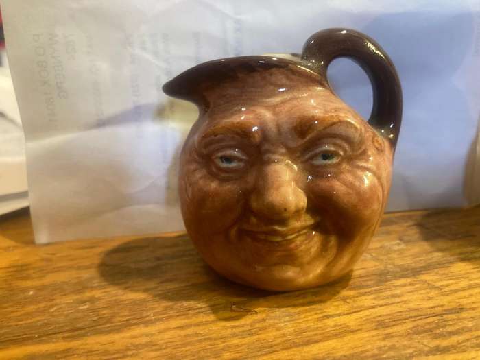 Collection of Royal Doulton character jugs , ashtrays and candle snufflers