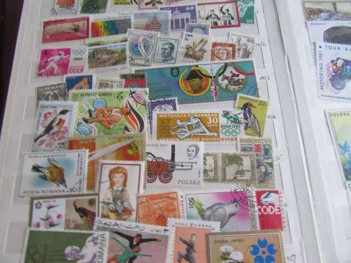 OLD STOCKBOOK - 14 PAGES FILLED WITH HUNDREDS OF INTERNATIONAL STAMPS - AS PER DCAN -BID PER PAGE -