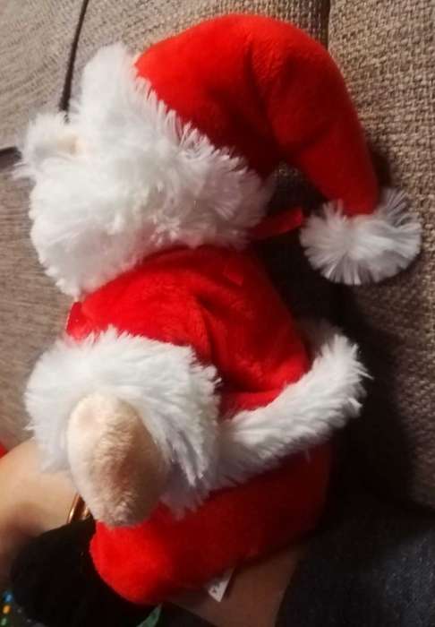 Plush Santa toy with satin bow. 24cm.