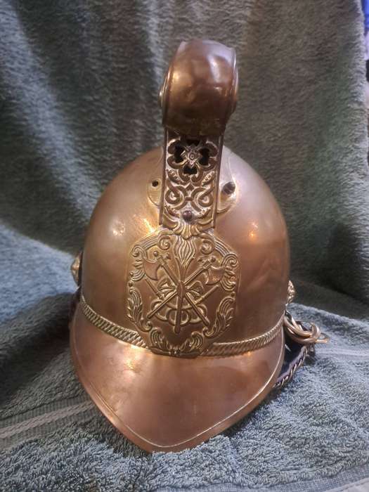 Vintage brass fireman's helmet