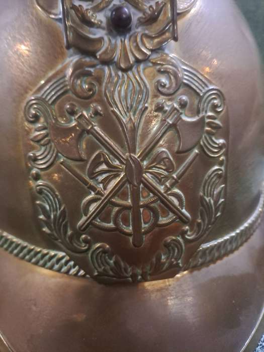Vintage brass fireman's helmet