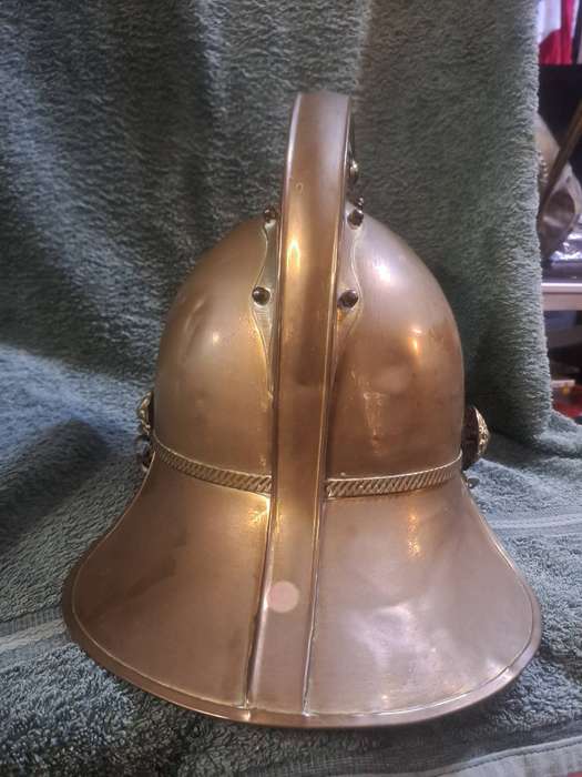 Vintage brass fireman's helmet
