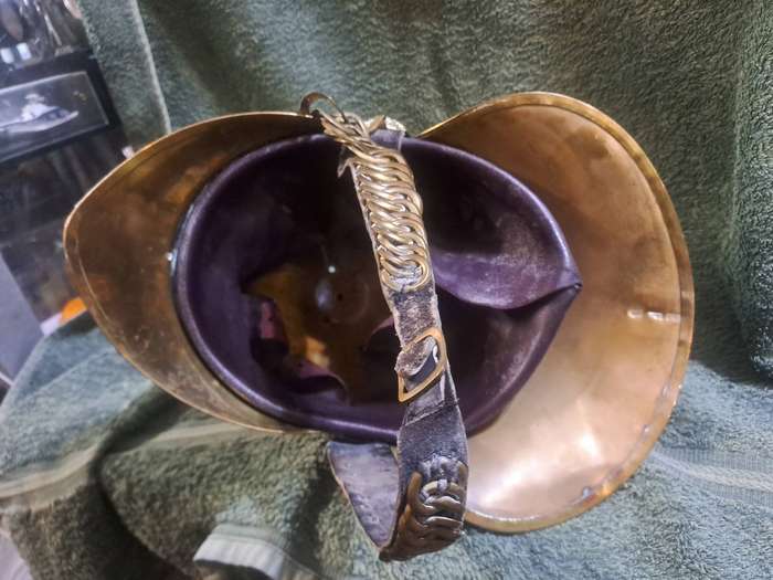 Vintage brass fireman's helmet