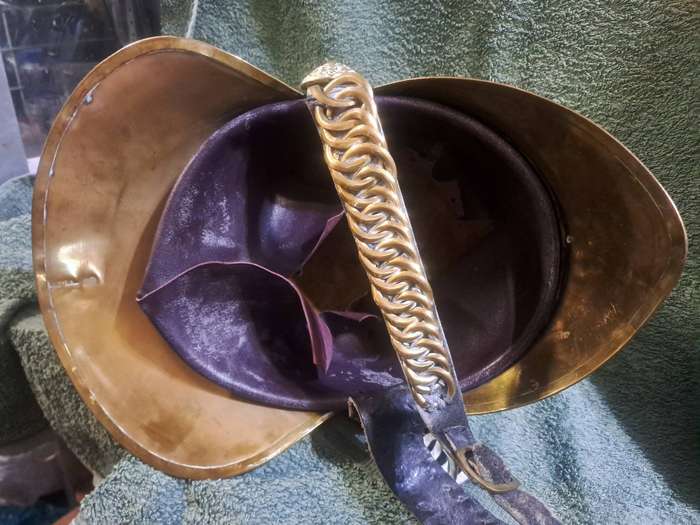 Vintage brass fireman's helmet
