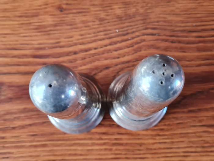 Stainless Steel Salt And Pepper Holders - Height 13 cm.