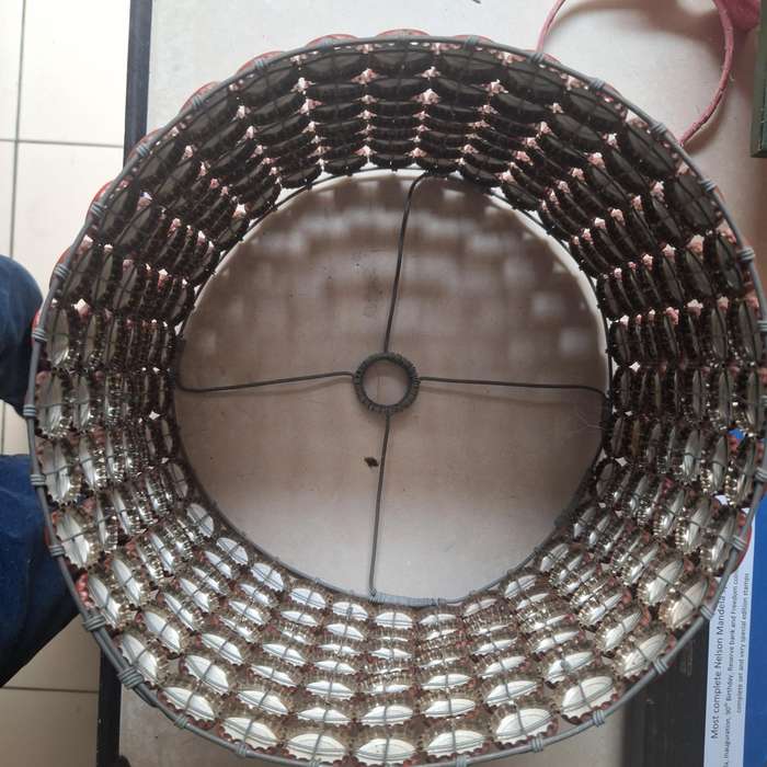 Lamp shade made from over 200 coca cola caps from 1999