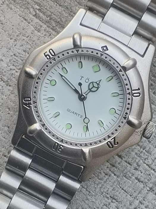 LADIES TORQ STAINLESS STEEL WATCH WITH ROTATING BEZEL IN EXCELLENT WORKING CONDITION