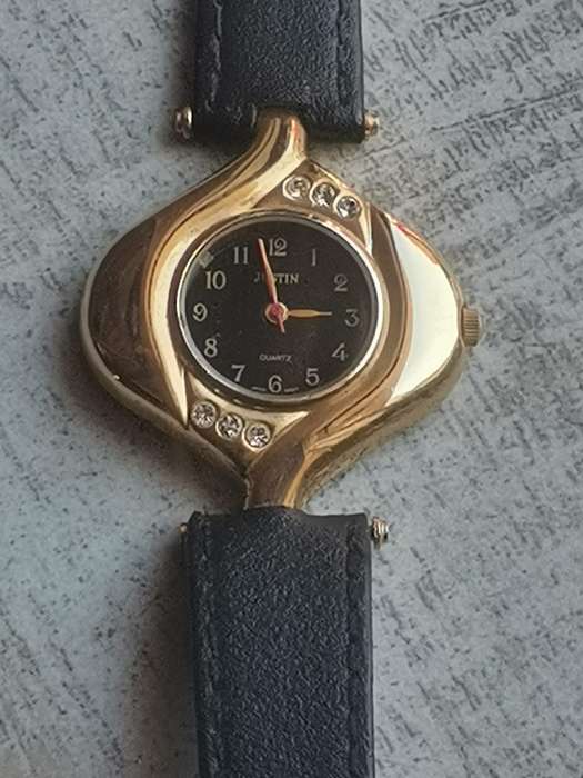 LADIES JUSTIN GOLD PLATED WATCH IN EXCELLENT WORKING CONDITION