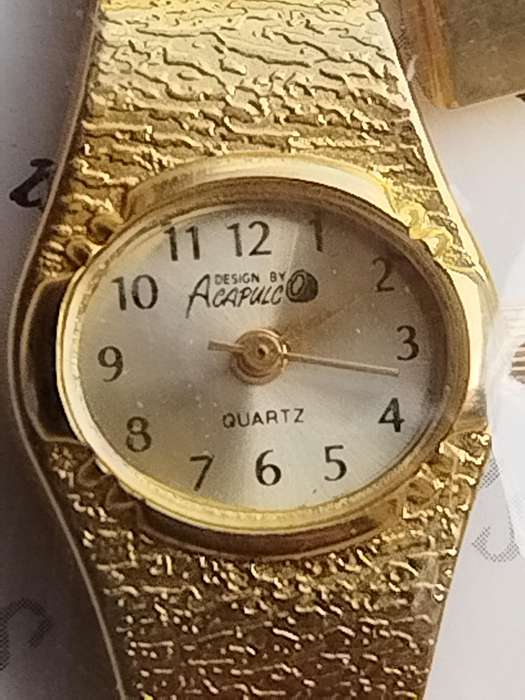 LADIES GOLD WATCH UNWORN STILL IN PLASTIC