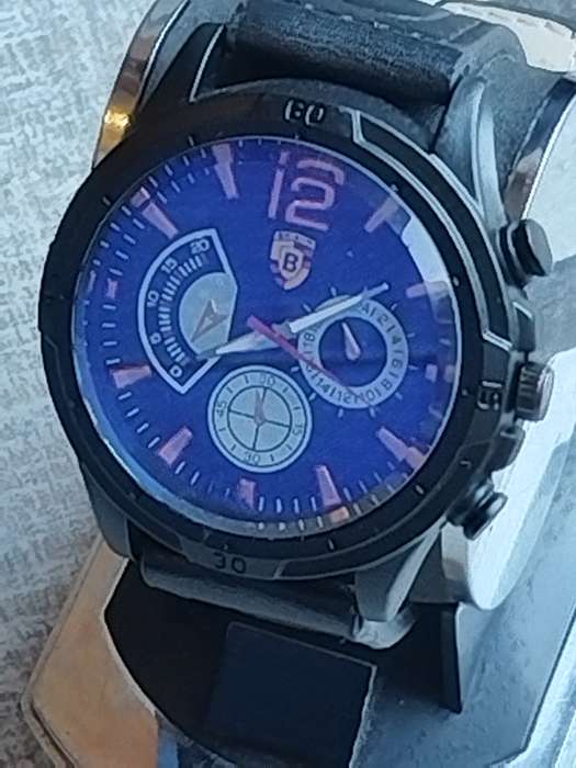 MENS BULKY BAISHA FASHION WATCH IN EXCELLENT WORKING CONDITION