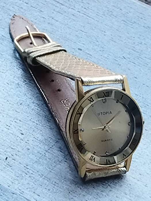 STUNNING AND ELEGANT LADIES UTOPIA ALL GOLD WATCH IN EXCELLENT WORKING CONDITION