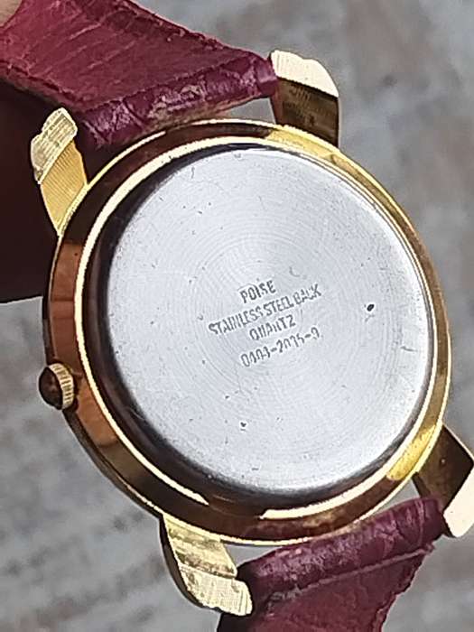 LADIES GOLD POISE WATCH WITH STUNNING PINK STRAP IN EXCELLENT WORKING CONDITION