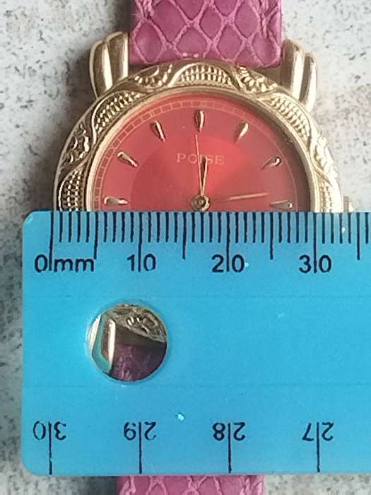 LADIES GOLD POISE WATCH WITH STUNNING PINK STRAP IN EXCELLENT WORKING CONDITION