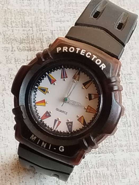 MENS MINI-G PROTECTOR QUARTZ WATCH IN EXCELLENT WORKING CONDITION