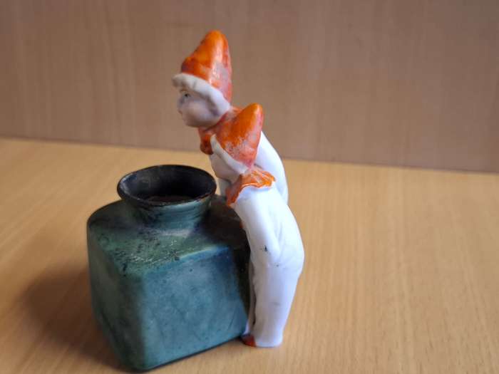 Boys Figurine with Small Vase