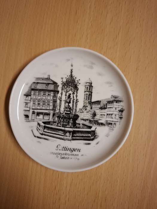 Small Round Kaiser Souvenir Plate - Goose Girl Fountain in Gottingen, Germany - width 10cm