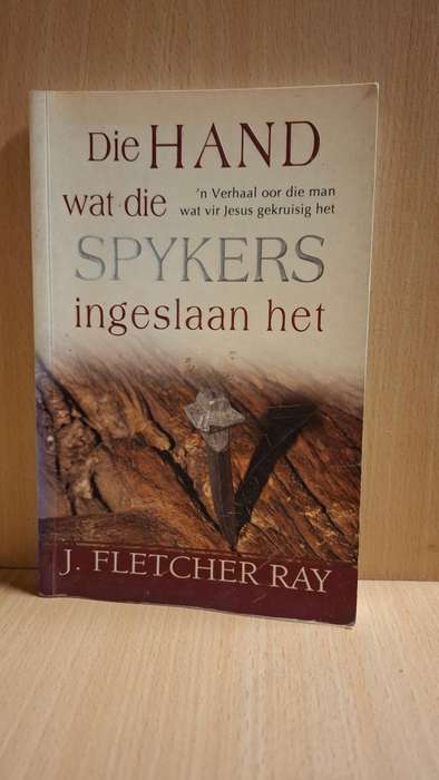 Di Hand wat die Spykers ingeslaan het : J. Fletcher Ray