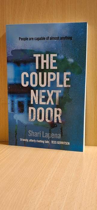 The Couple Next Door: Shari Lapena  (Large Paperback)  NEW CONDITION
