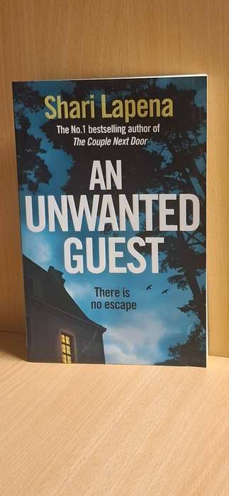 An Unwanted Guest : Shari Lapena  (Large Paperback)  NEW CONDITION