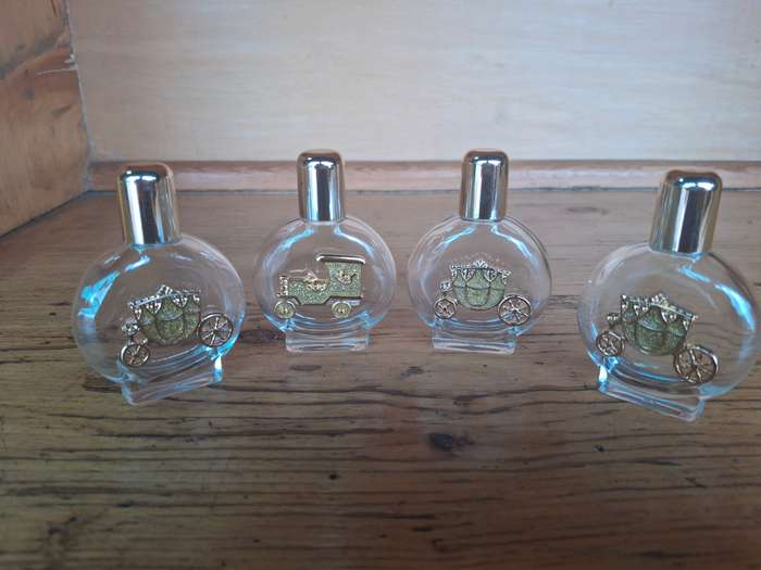 Four nice glass perfume bottles