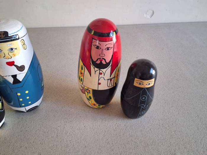 Two nesting dolls one is incomplete