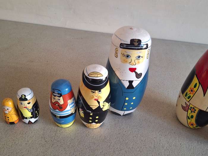 Two nesting dolls one is incomplete