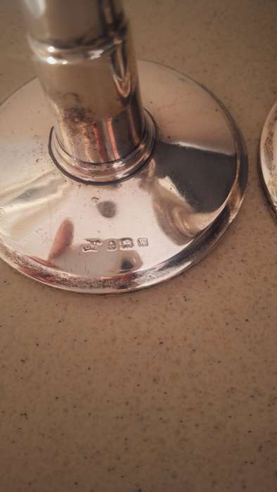 A pair of vintage hallmarked sliver candles