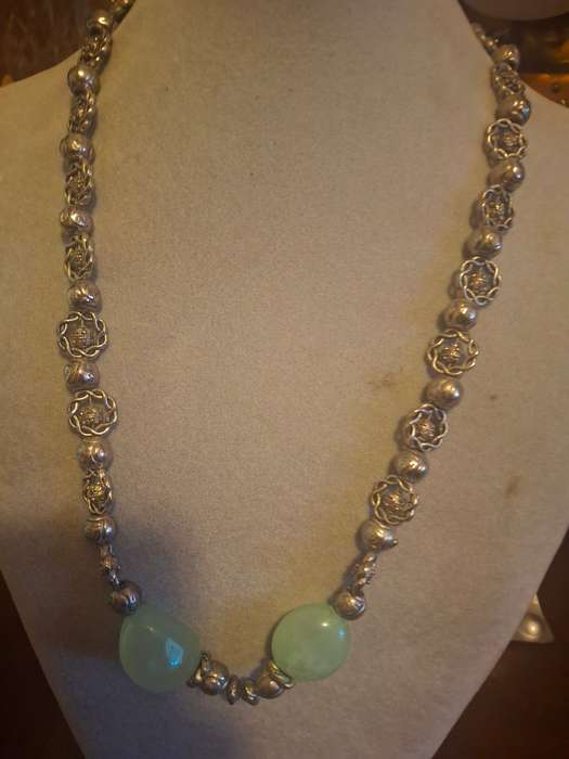 Long sliver tone costume necklace with semi precious stones