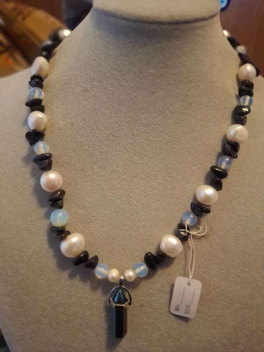 Well made beaded pearl.and stone necklace
