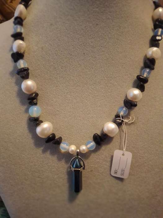 Well made beaded pearl.and stone necklace