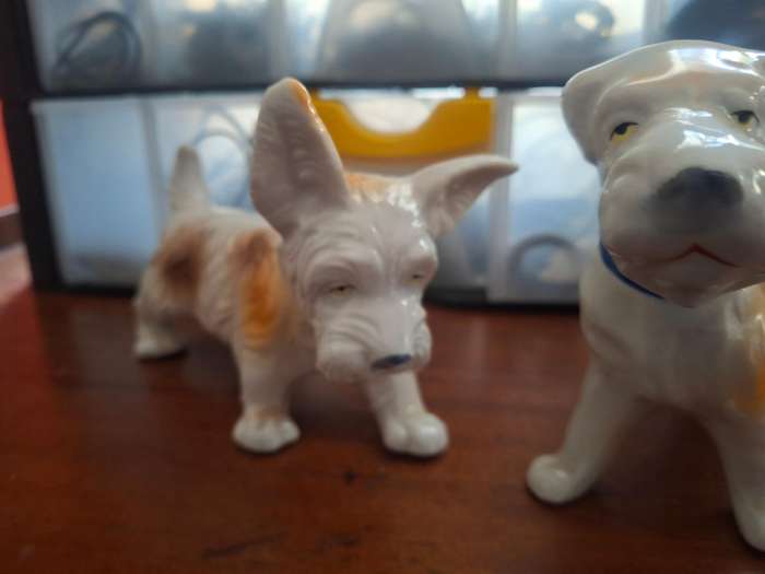 Twp cute procelian dog models
