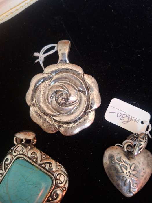 Three ladies costume pendants