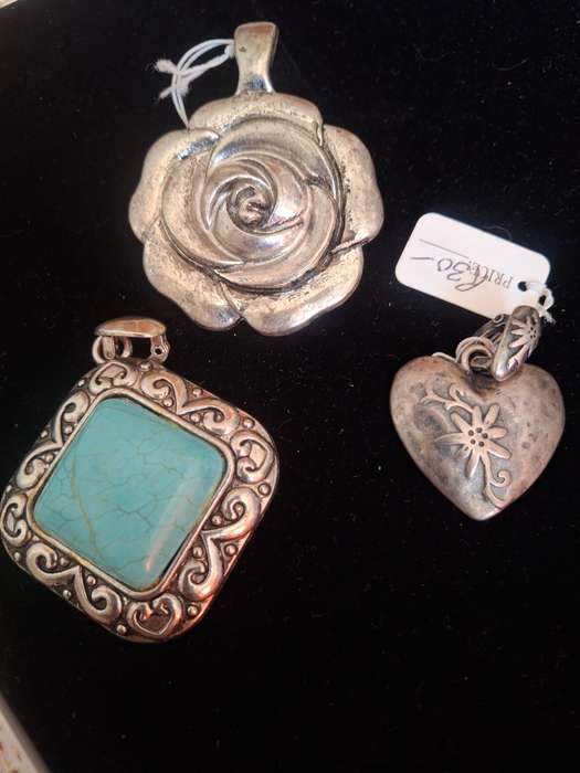Three ladies costume pendants