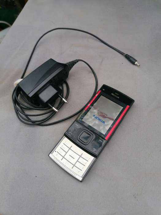 Nokia x3 cellphone with charger