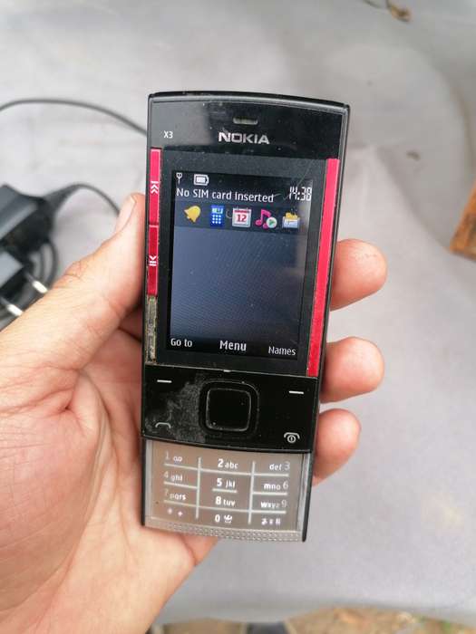 Nokia x3 cellphone with charger