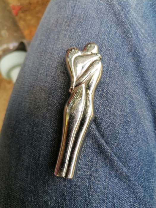 Vintage nude man and women kissing lighter